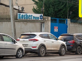 ... Nein, nicht zu "koscher Pizza" ...